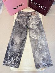 Acne Studios 3D ink-splattered mud-dyed printed jeans  - 4