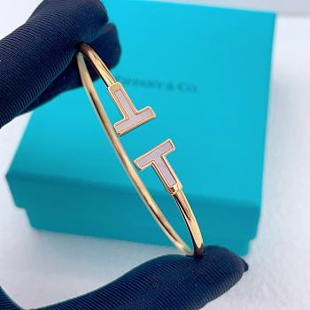 Tiffany's Latest White Mother-of-Pearl Double T Rose Gold Bangle
